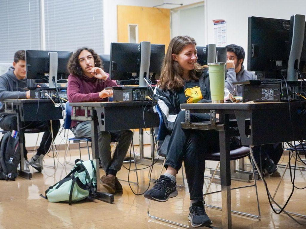 students in a classroom at computers